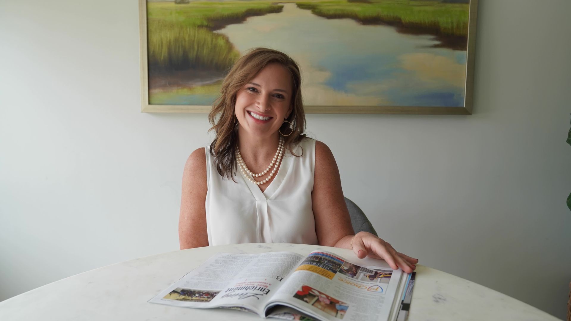 Kellie Collins sitting at table